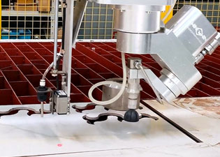 Why does water jet cutting need a laser height measurement system?